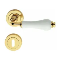 MANIGLIA OTTONE DALIA C/BOCCHETTA CERAM LUC BIA